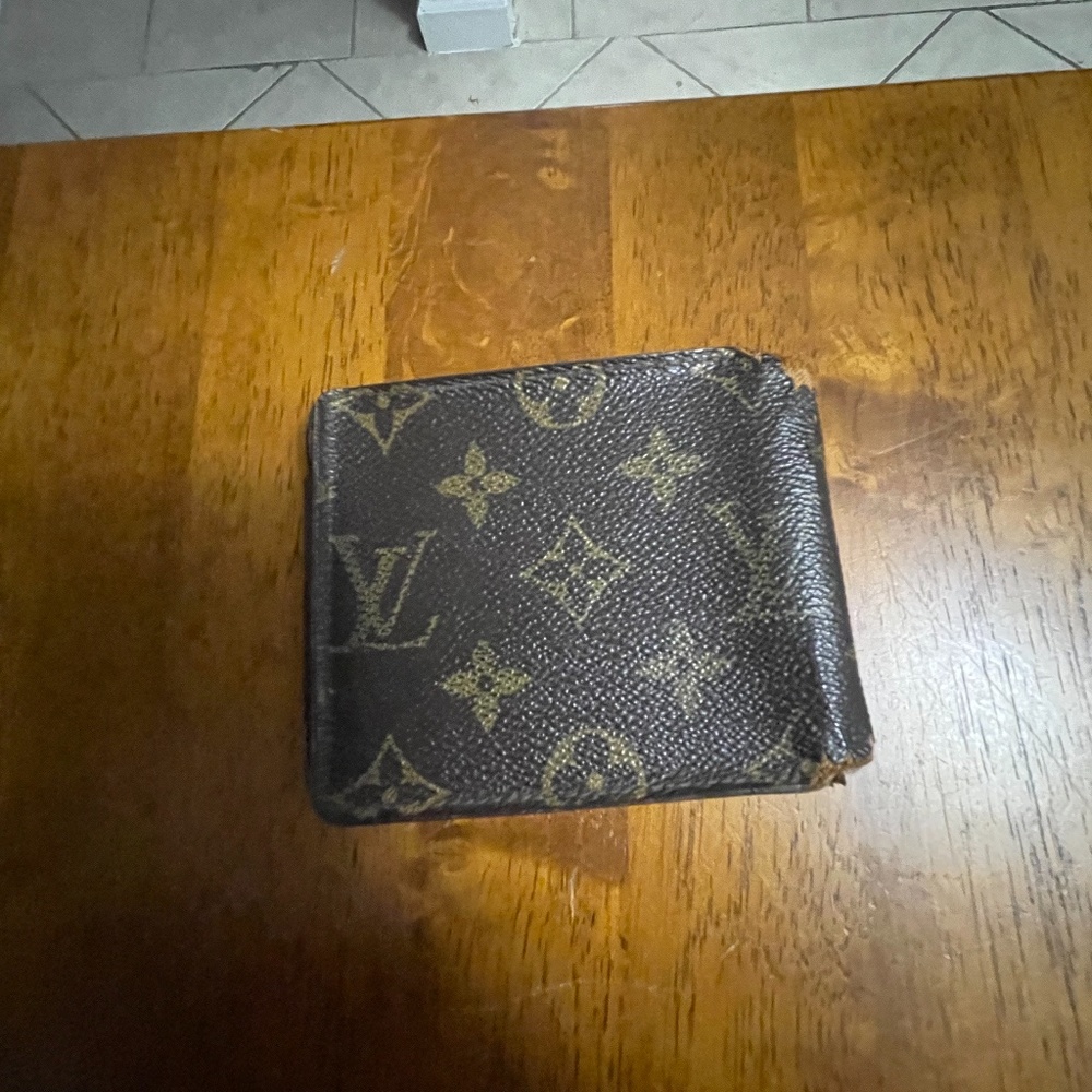 Louis Vuitton monogram men’s bi-fold wallet